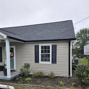 Residential exterior project completed by Good Boy Gutter Protection
