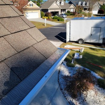 Good Boy Gutter Protection project image showing gutter work on a residential home